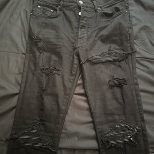 AMIRI Black Distressed Skinny Jeans